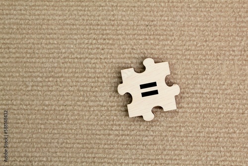 Obraz na plátně wooden puzzle with an equivalent icon