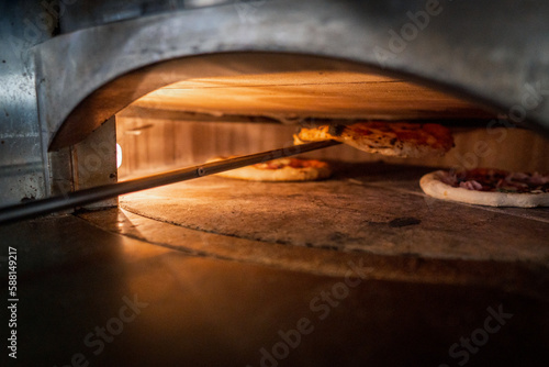Pizza Napoletana Italian Pizza in the making by cook 