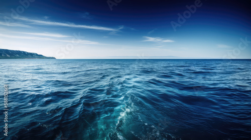 Deep blue ocean horizon against a pale blue sky © Oliver