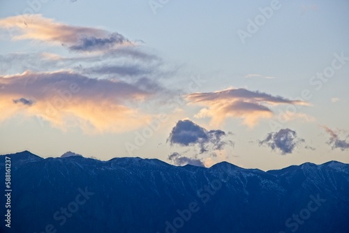 The sun sets over the Sierra Nevada Mountains, as seen from near Bishop, one of the larger cities in the Eastern Sierra region.