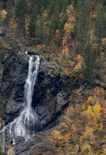 Wild norwegian waterfall in Rjukan  during the picturesque autumn colors