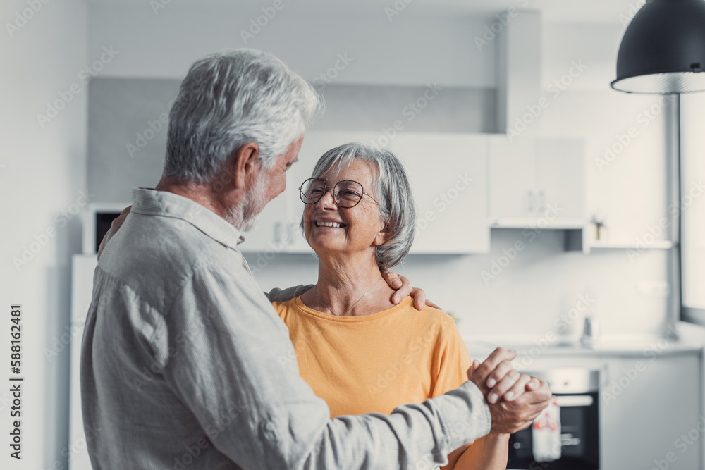 Joyful active old retired romantic couple dancing laughing in living room, happy middle aged wife and elder husband having fun at home, smiling senior family grandparents relaxing bonding together
Joyful active old retired romantic couple dancing laughing in living room, happy middle aged wife and elder husband having fun at home, smiling senior family grandparents relaxing bonding together