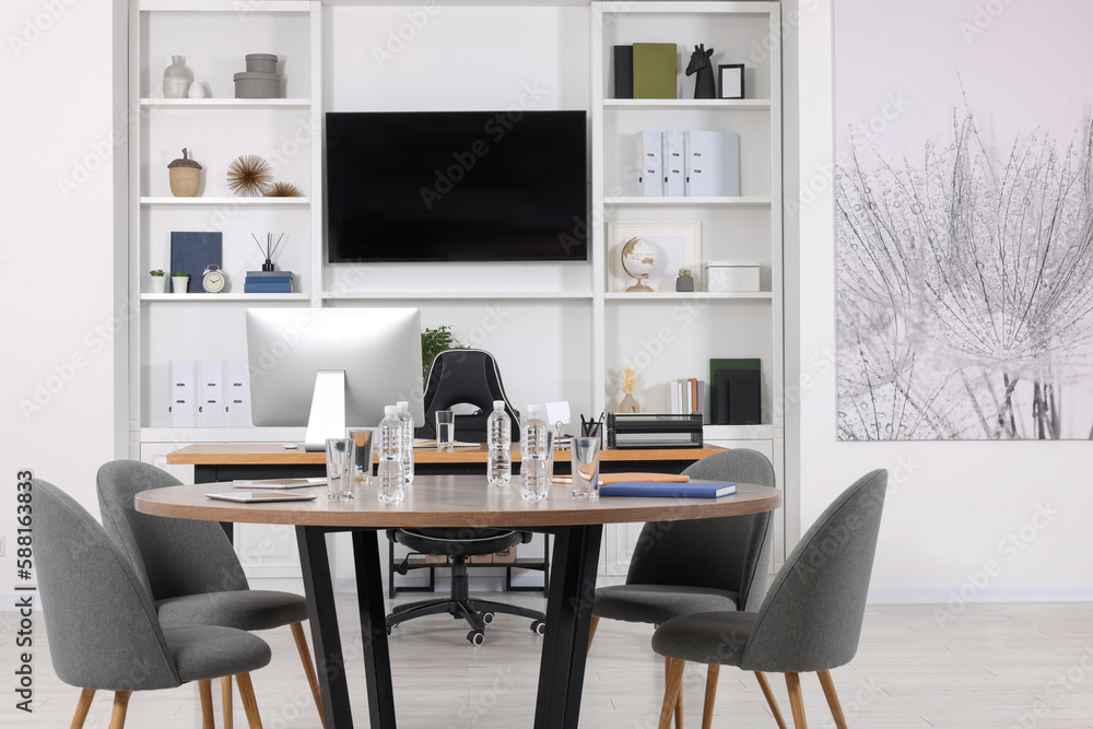 Stylish office with comfortable furniture and tv zone. Interior design Stylish office with comfortable furniture and tv zone. Interior design