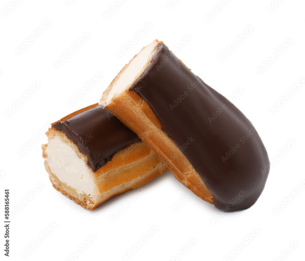 Cut delicious eclair covered with chocolate isolated on white Cut delicious eclair covered with chocolate isolated on white