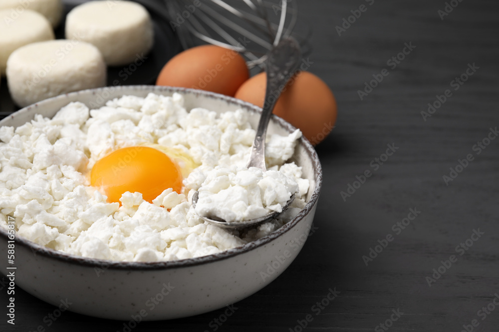 Different ingredients on grey table, space for text. Cooking cottage cheese pancakes Different ingredients on grey table, space for text. Cooking cottage cheese pancakes