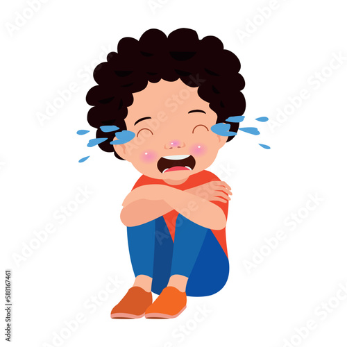 unhappy boy sitting with hands on knees
