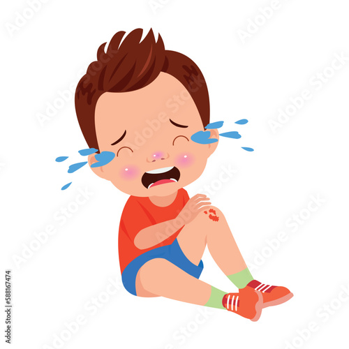 sad knee bleeding boy falling down