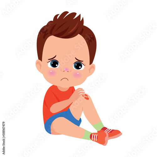 sad knee bleeding boy falling down