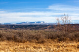 Western Colorado landscape with distant snowy mountains