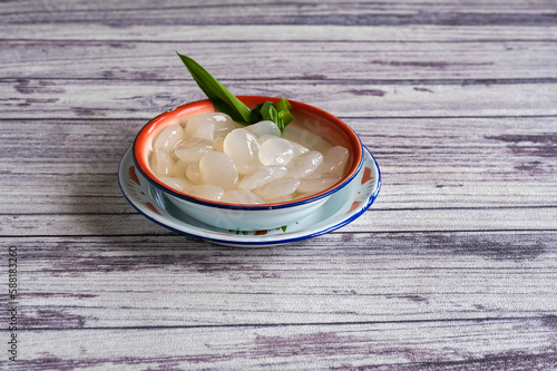 manisan kolang kaling or preserved sugar palm fruit, Indonesian drink and dessert during month of ramadan.  photo