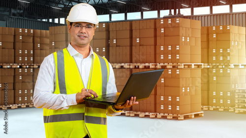 Storekeeper with laptop. Ma...