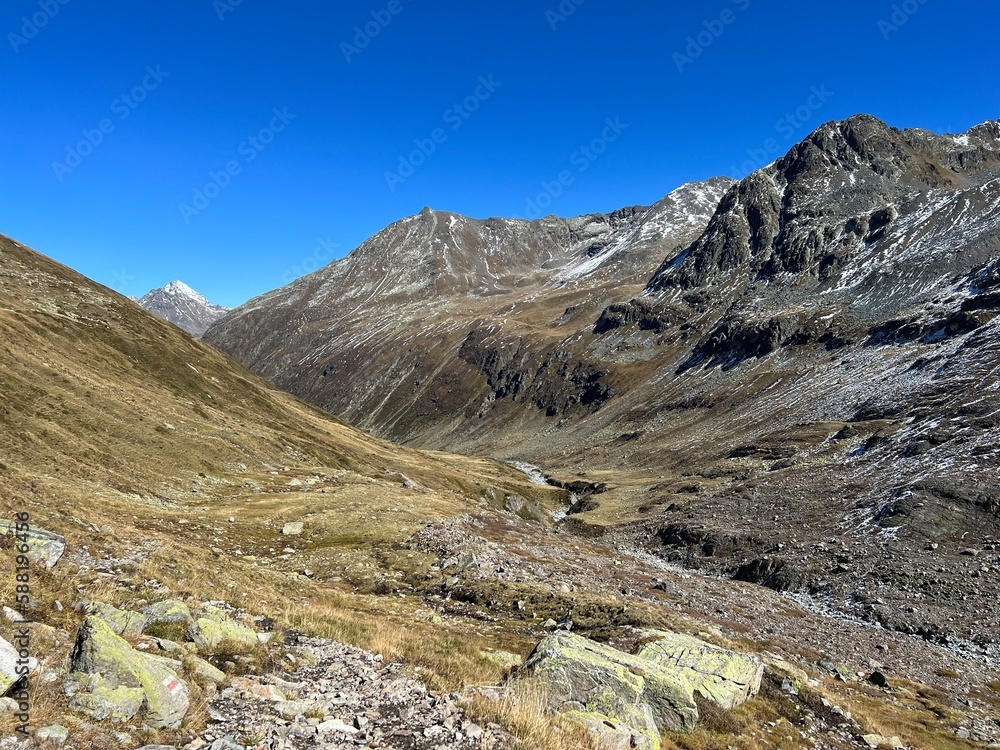 Beautiful autumn panorama of the alpine valley Val Grialetsch and the stream Aua da Grialetsch in the Albula Alps mountain massif, Zernez - Canton of Grisons, Switzerland (Schweiz)