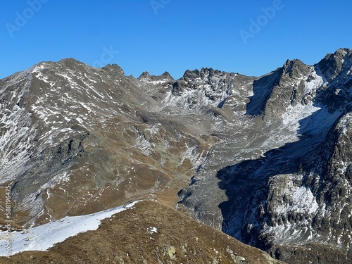 Beautiful autumn panorama of the alpine valley Val Grialetsch and the stream Aua da Grialetsch in the Albula Alps mountain massif, Zernez - Canton of Grisons, Switzerland (Schweiz) photo