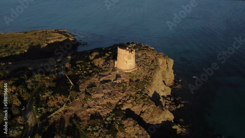 Sardinia aerial coast, tower of Cannai in Sant'Antioco, zoom out photo