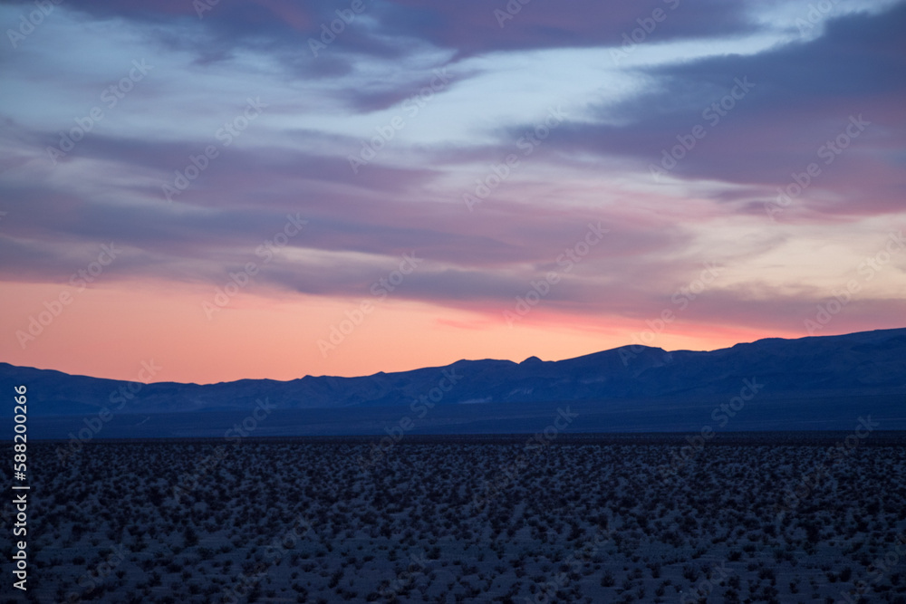 Sailing down a roughly paved road through the desolate Panamint Valley