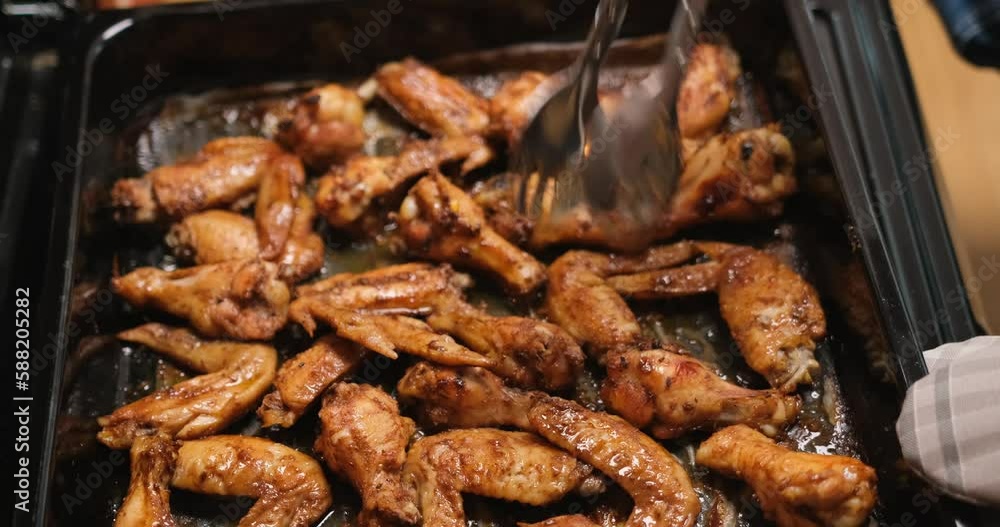 Buffalo Chicken wings cooking in electric oven Buffalo Chicken wings cooking in electric oven