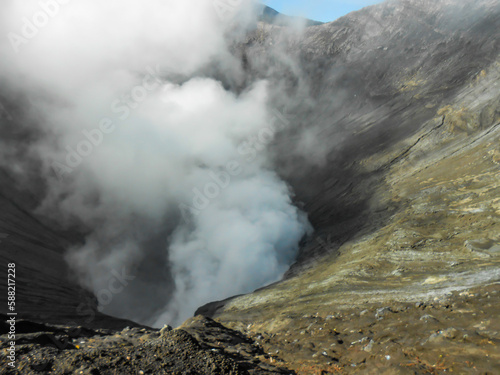 Volcano crater spewing smoke activity at Mount Bromo Tengger Semeru National park