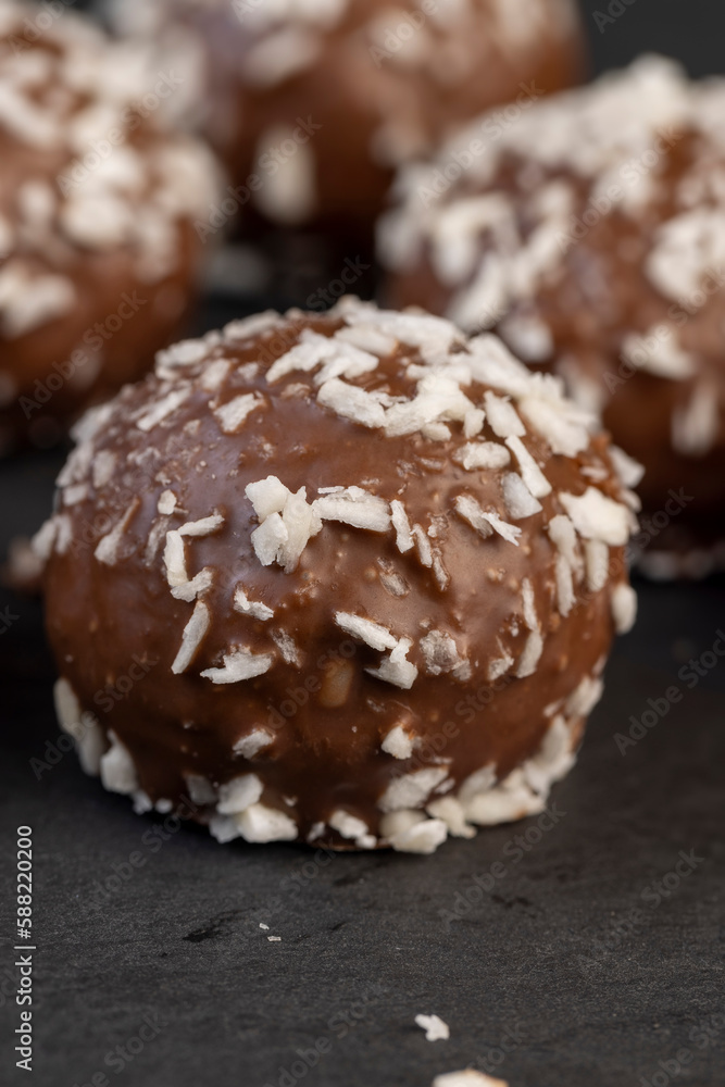 Chocolate candies in the form of balls with milk coconut Chocolate candies in the form of balls with milk coconut