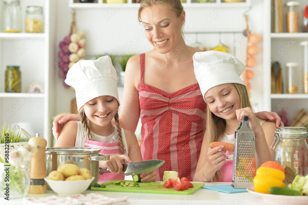 Cute girls with mother preparing Cute girls with mother preparing