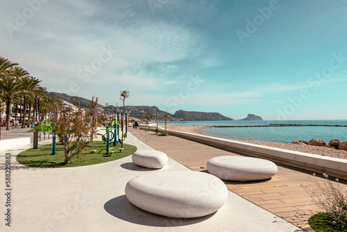 Altea seaside promenade with recreation and active leisure areas on sunny day. Altea - beautiful authentic Spanish village in Alicante Province, Valencian Community, by Mediterranean Sea in Spain