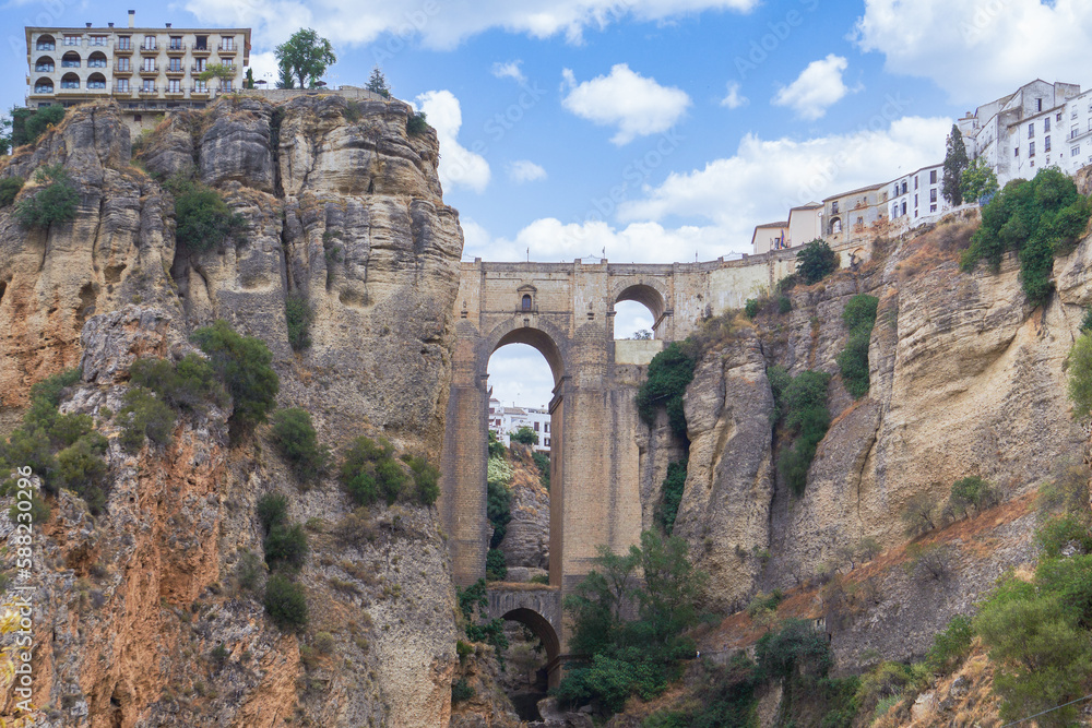 views from the river of the new bridge of Ronda over the cliff .Andalusia,malaga , Spain