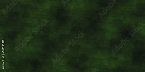 Abstract background with blur green texture fabric . elegant dark emerald green background with black shadow border and fabric grunge texture design .	