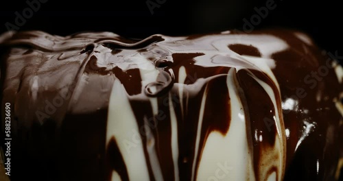 Chocolatier Chef Smothers Dessert in Melted Chocolate, Rotating Table, Macro photo