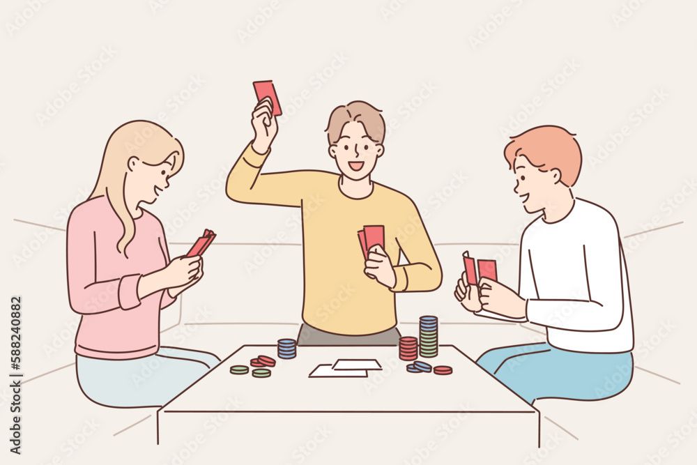 Group of friends playing poker sitting at table with chips enjoy gambling and relaxing together Group of friends playing poker sitting at table with chips enjoy gambling and relaxing together
