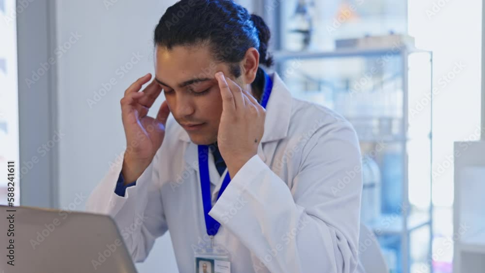 Man, scientist and stress headache in laboratory health, fatigue or temple massage from mistake. Science, burnout and male Indian doctor with laptop, frustrated and migraine pain in medical research Man, scientist and stress headache in laboratory health, fatigue or temple massage from mistake. Science, burnout and male Indian doctor with laptop, frustrated and migraine pain in medical research