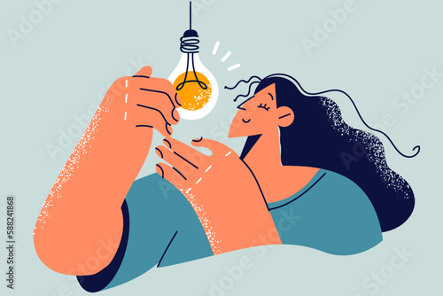 Beautiful woman with light bulb symbolizing promising idea or brilliant thought invented by human