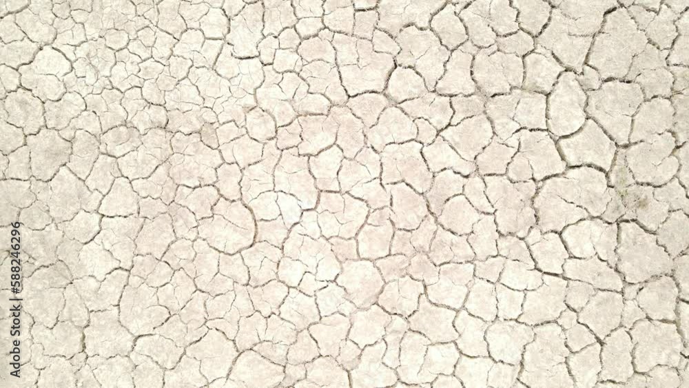 Aerial zoom out of a dry rural field on a sunny day in the outdoors Aerial zoom out of a dry rural field on a sunny day in the outdoors