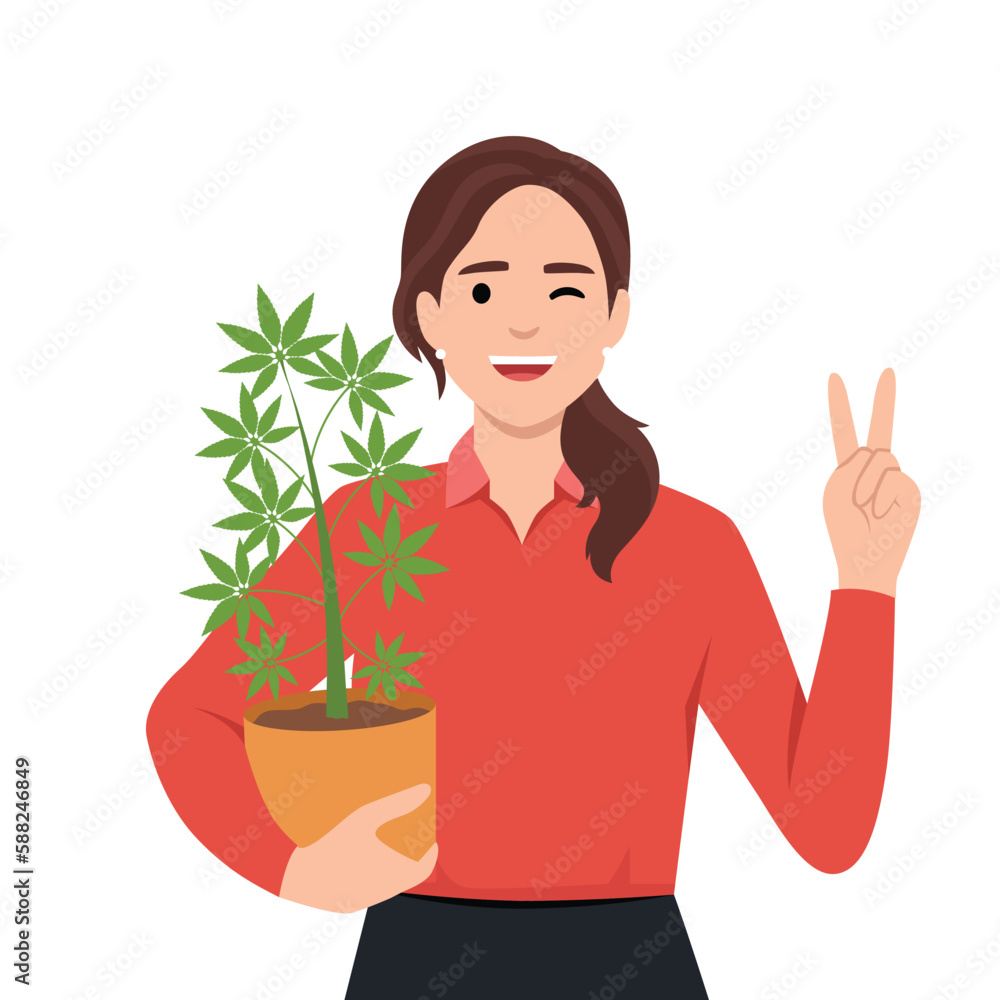 Woman holding cannabis plant in pot and giving peace sign as she is supporting the use of cannabis. Weed or marijuana Woman holding cannabis plant in pot and giving peace sign as she is supporting the use of cannabis. Weed or marijuana