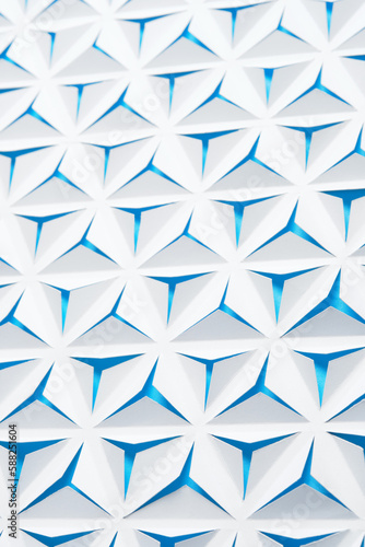 White-blue abstract paper background with triangles.