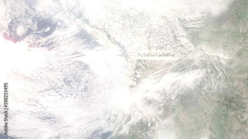 Earth zoom in from outer space to city. Zooming on Lacey, Washington, USA. The animation continues by zoom out through clouds and atmosphere into space. Images from NASA