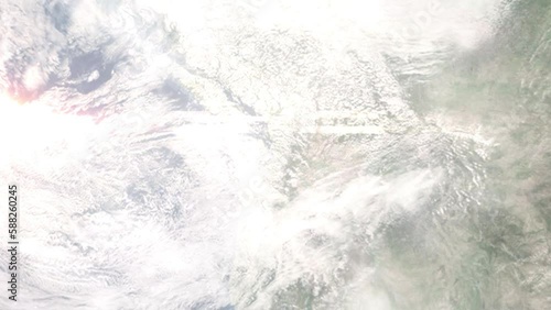 Earth zoom in from outer space to city. Zooming on Issaquah, Washington, USA. The animation continues by zoom out through clouds and atmosphere into space. Images from NASA photo