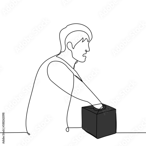 man with an emotion of fear or disgust put his hand into a small black box with a narrow opening - one line drawing vector. concept game where you have to guess the contents of the box without looking