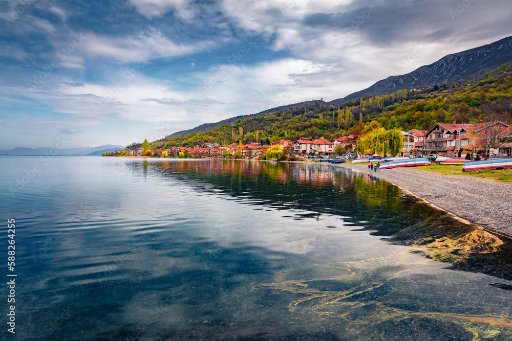 Fototapeta premium Calm spring cityscape of Peshtani town. Stunning morning scene of Ohrid lake, North Macedonia, Europe. Traveling concept background.