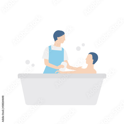 入浴する男性と介助する介護福祉士