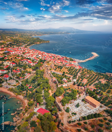 Stunning morning view from flying drone of Koroni town, Messenia, Peloponnese, Greece, Europe. Colorful summer seascape of Ionina sea. Traveling concept background..