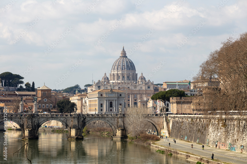 Rome under the snow. Vatican City in Italy on a summer day. St. Peter's basilica in the background, St. Angel's caste and bridge.