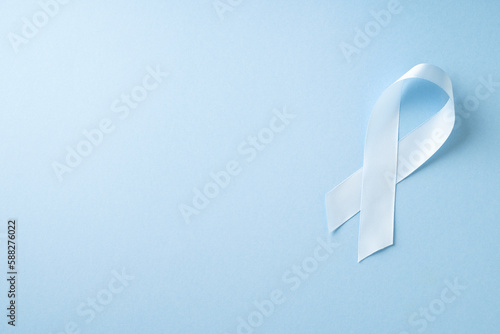 World diabetes day, cancer concept with ribbon on blue background