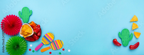 Fototapeta Naklejka Na Ścianę i Meble -  Cinco de Mayo (Fifth of May) Fiesta Celebration Concept on Blue Background.
