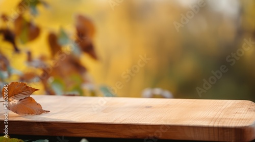 Wooden board in the foreground blurred foliage