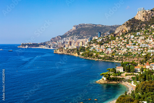 High angle view of Monaco, Monte Carlo,  from Roquebrune, France. Panoramic view. Summer 2022. Horizontal image. © Olga