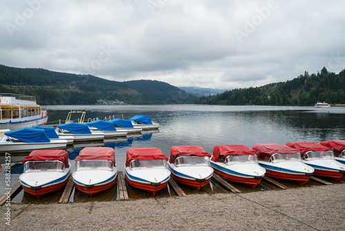 Boats on row in lake at The Black Forest Village ,Germany . Boat for tourist to rent for travel.