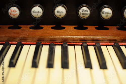 Close-up of a piano keys oir keyboard of old, historic clavichord or harpsichord