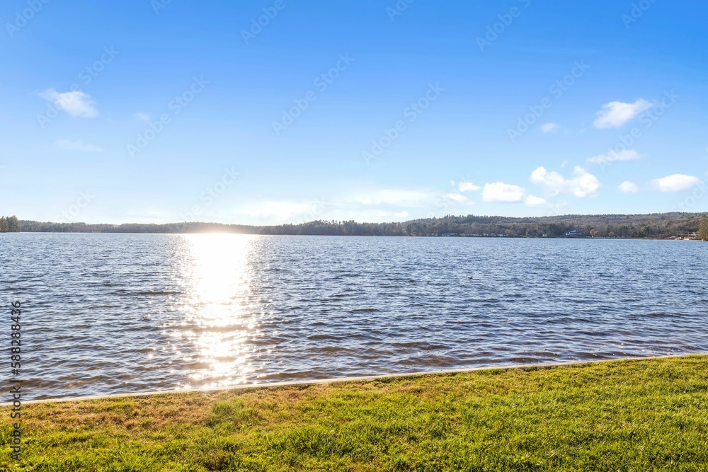 Beautiful view of the lake near the forest in Winnisuqam, USA