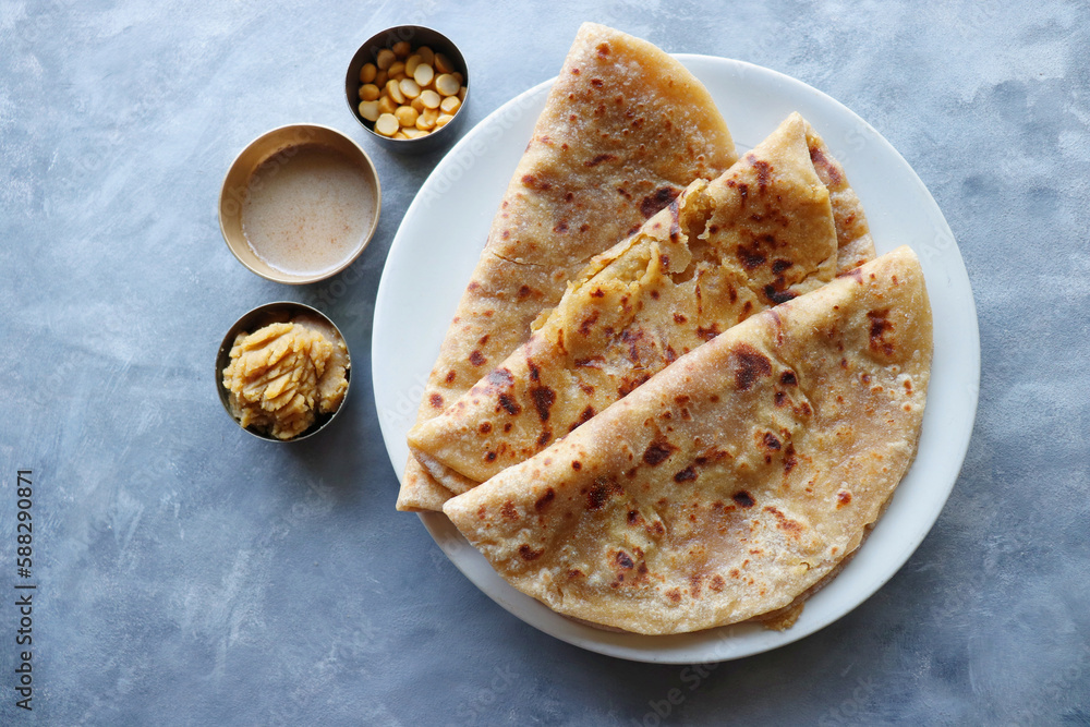 Puran Poli is an Indian sweet flatbread stuffed with chana dal, jaggery