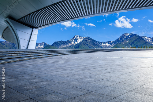 Empty square floor and bridge with mountain background © ABCDstock