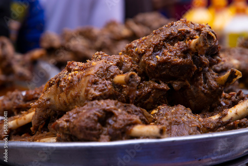 Roasted leg pieces of mutton at a street food market in Dhaka, Bangladesh
